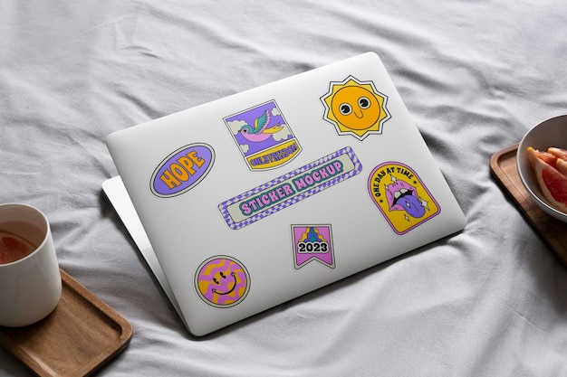 PSD top view laptop sticker mockup