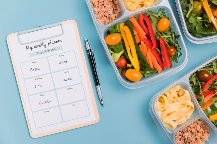 PSD top view of meals with notepad