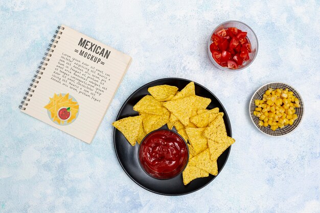 Top view of mexican restaurant food with nachos and corn