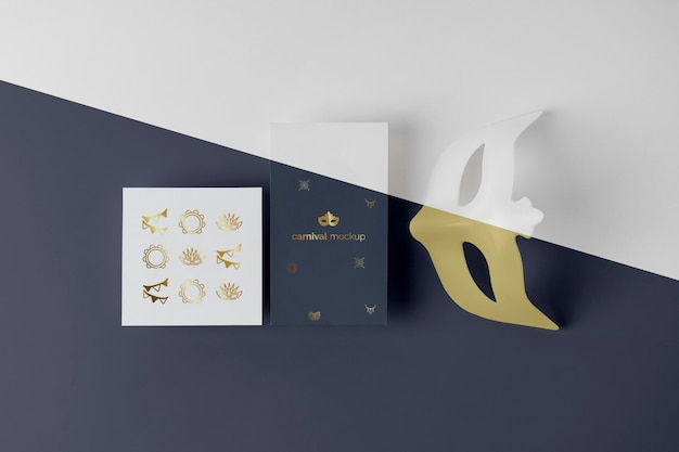 PSD top view of minimalistic carnival invitation with mask