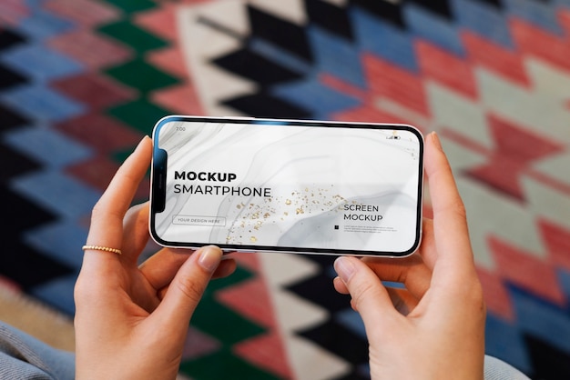top view model holding a smartphone