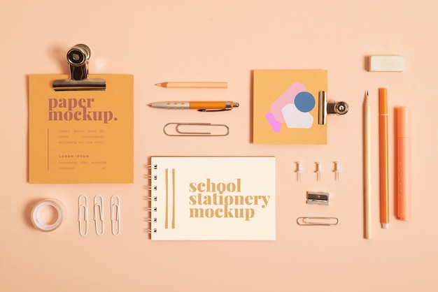 top view of monochrome stationery collection with pastel colors
