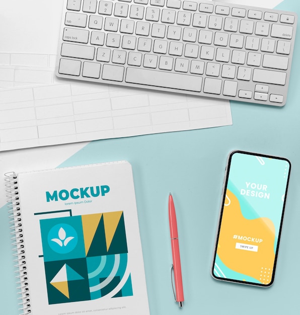 PSD top view notebook next to mobile