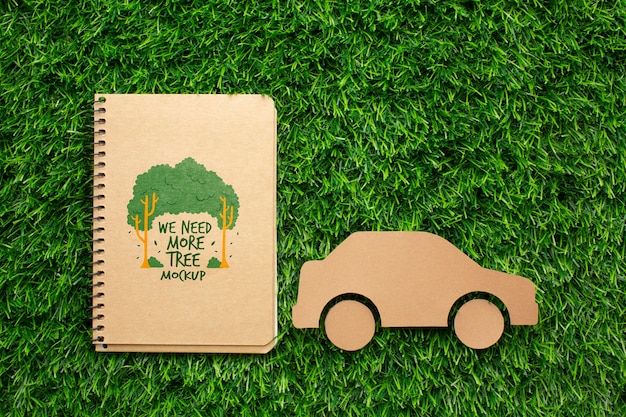 top view notebook mock-up and paper car