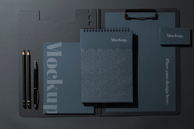 top view notebook and pens