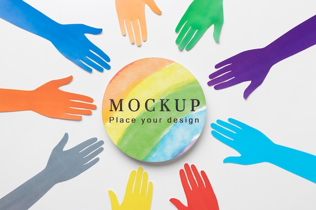 Top view of rainbow colored hands for diversity