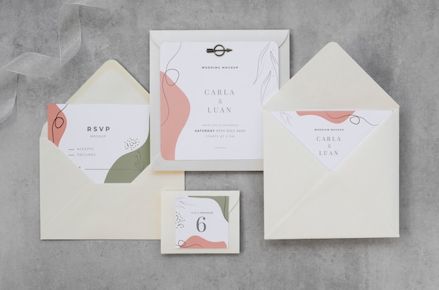 Top view of wedding cards with envelopes
