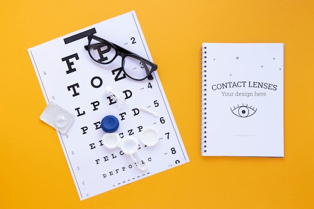 top view optics still life arrangement on yellow background