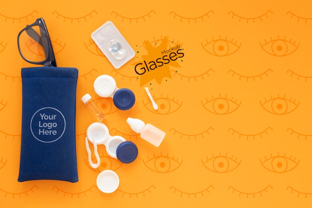 top view optics still life composition on orange background