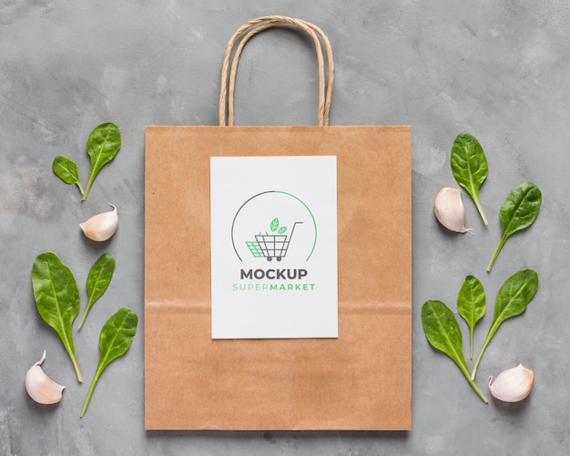 PSD top view paper bag mock-up and leaves