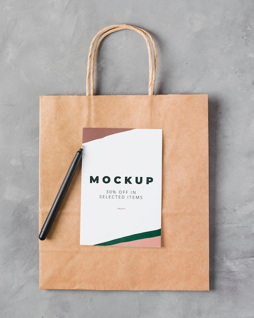 top view paper bag mock-up with pen