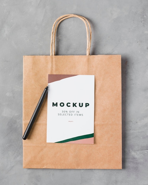 PSD top view paper bag mock-up with pen