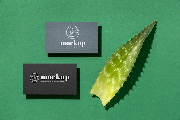 PSD top view of paper stationery with leaf