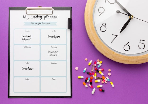 Top view pills and clock arrangement