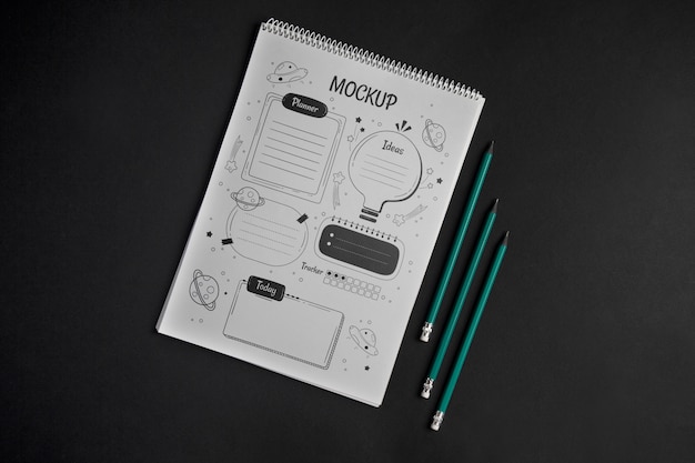 Top view sketchbook with drawings mockup