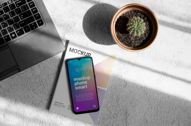 PSD top view over smartphone and magazine mockup