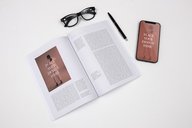 PSD top view smartphone and magazine mockup