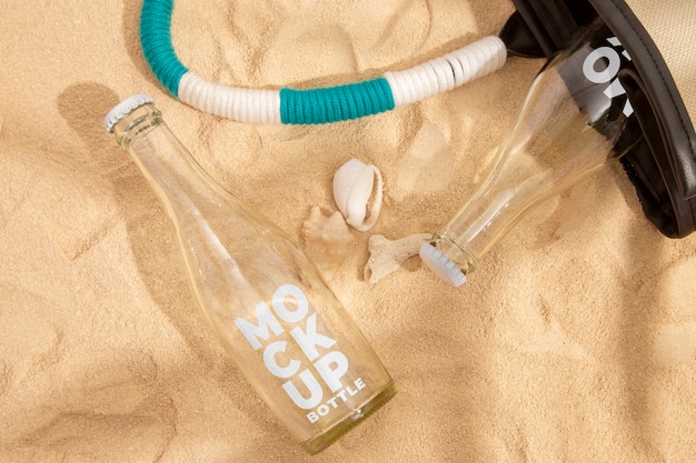 Top view soda bottle on the beach