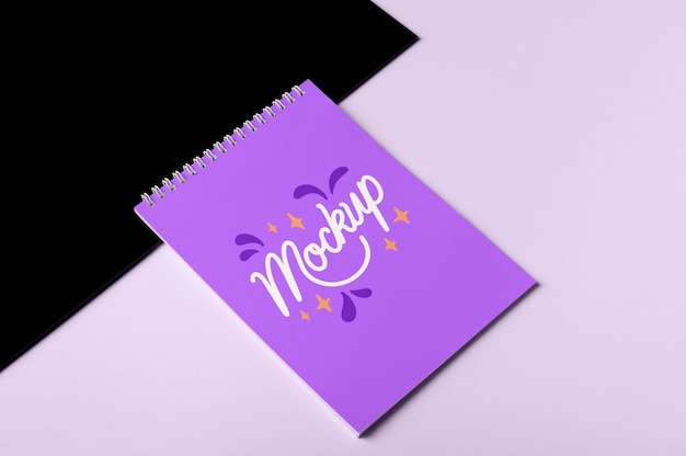 PSD top view over spiral notebook mockup