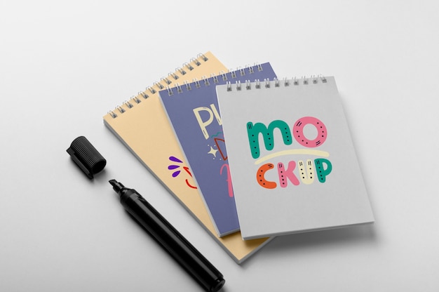 PSD top view over spiral notebook mockup