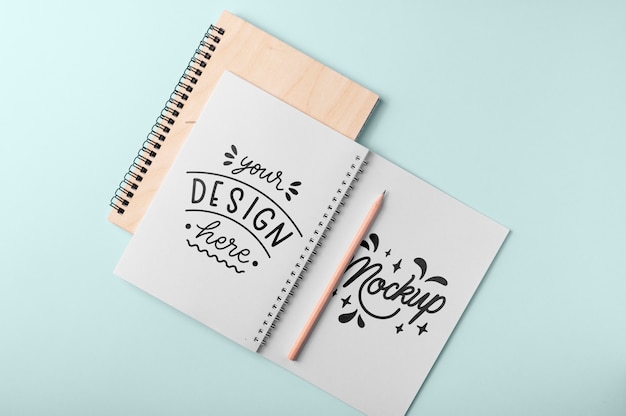 PSD top view over spiral notebook mockup