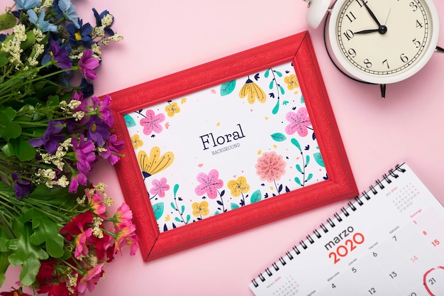 PSD top view of spring flower with calendar and frame