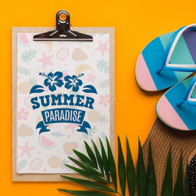 PSD top view summer paradise clipboard and flip flops