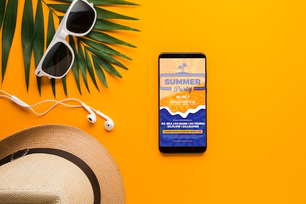 top view sunglasses with hat and mobile phone