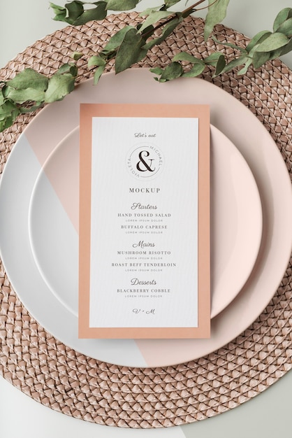 Top view of table arrangement with spring menu mock-up and placemat