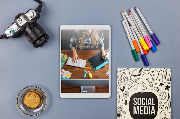 Top view tablet mockup with desk elements