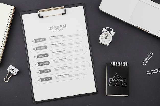 Top view timetable with mock-up and paper clips