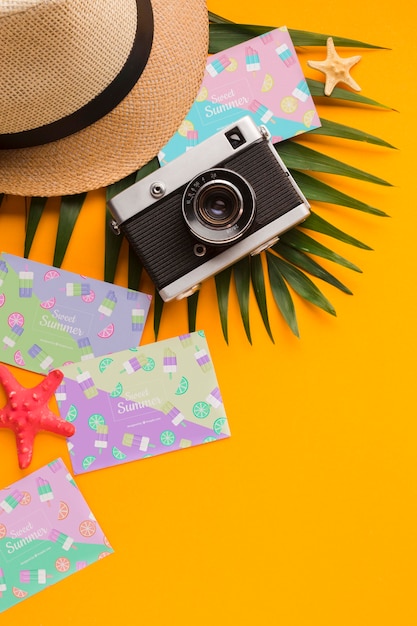 PSD top view travel hat with summer cards and camera