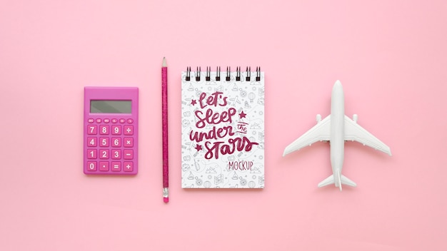 PSD top view travelling plane and pink calculator