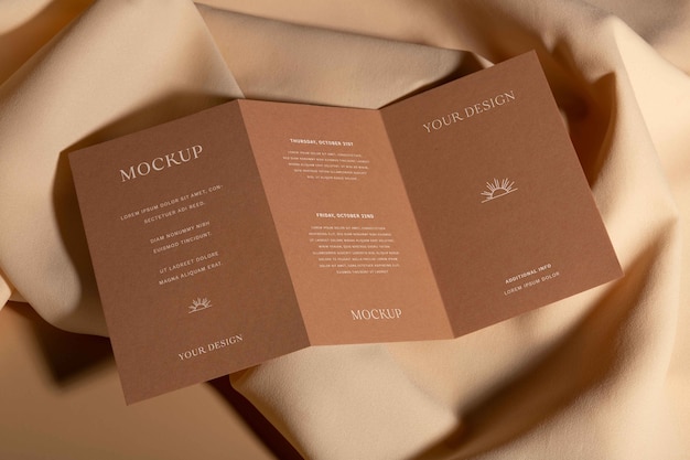 PSD top view on trifold wedding invitation mockup