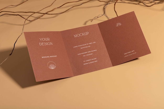 PSD top view on trifold wedding invitation mockup