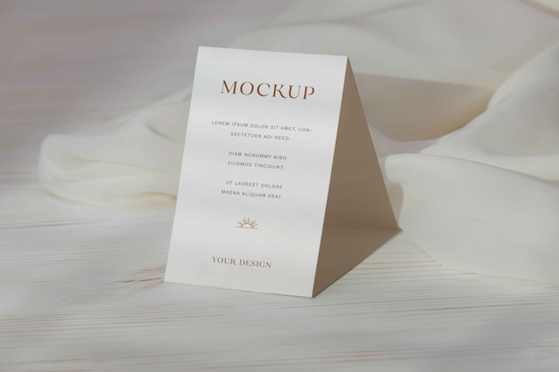 Top view on trifold wedding invitation mockup