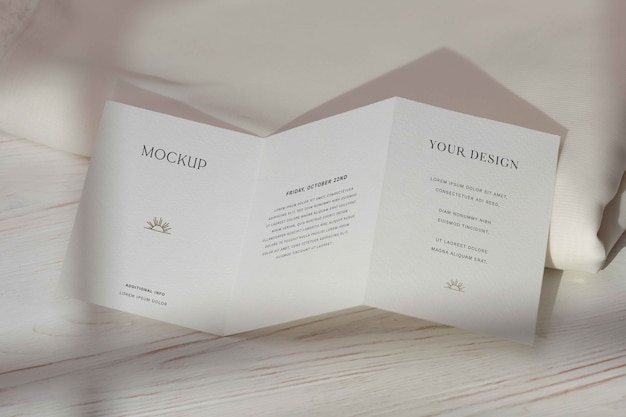 PSD top view on trifold wedding invitation mockup