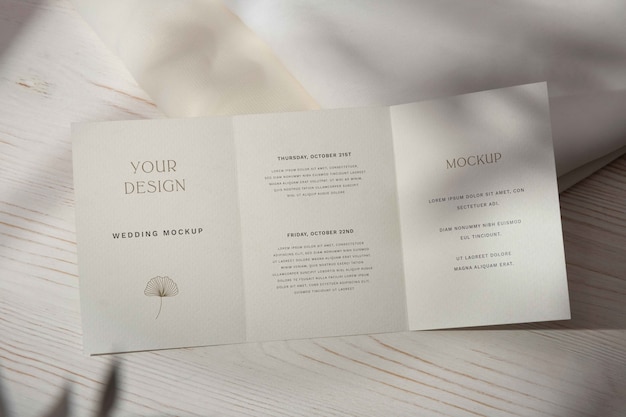 PSD top view on trifold wedding invitation mockup