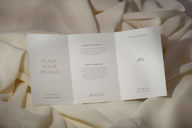 PSD top view on trifold wedding invitation mockup