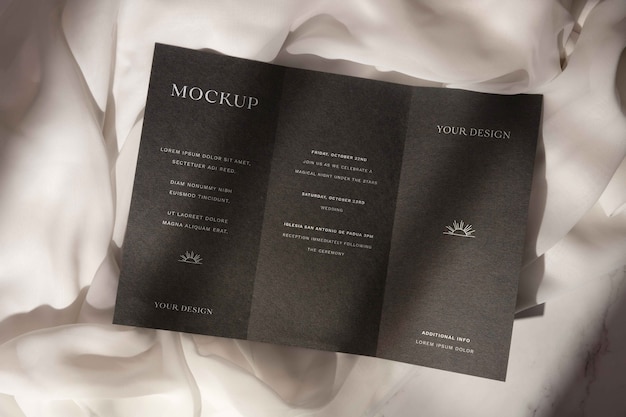 PSD top view on trifold wedding invitation mockup