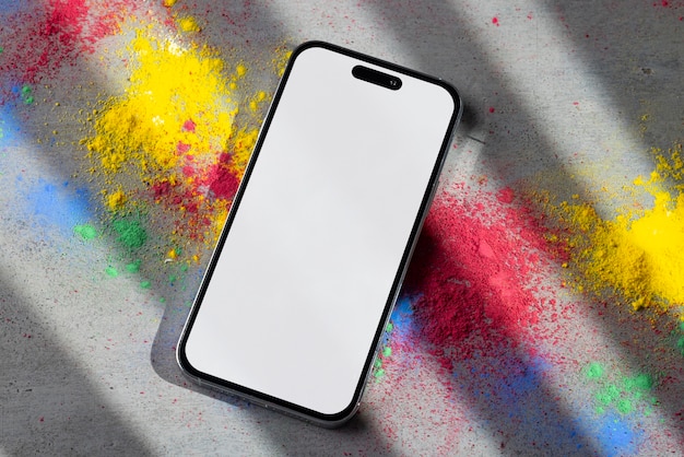 PSD top view van het holi-festival met een smartphone-mockup