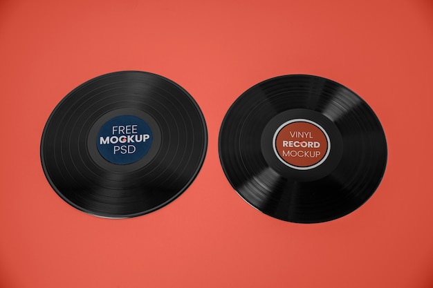 PSD top view vinyl records with red background