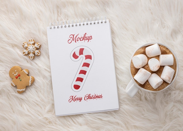 PSD top view winter hygge composition with notepad mock-up