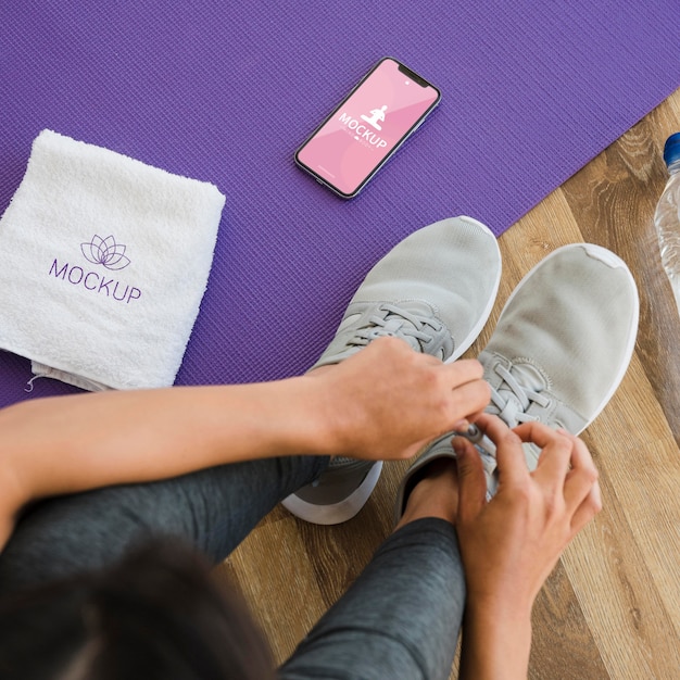 Top view woman getting ready for yoga