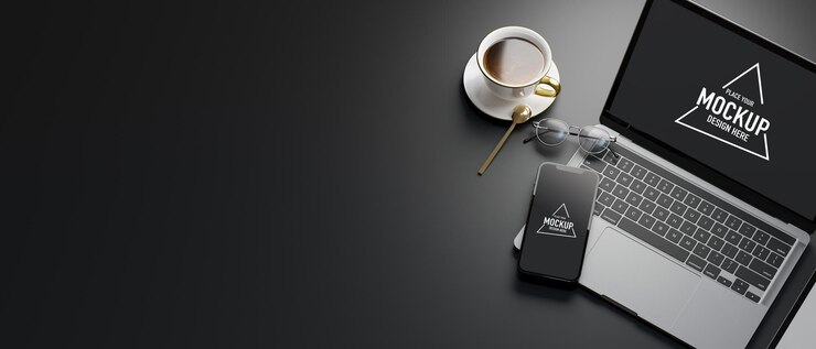 PSD top view of working space with laptop, smartphone, coffee cup and copy space, 3d rendering, 3d illustration