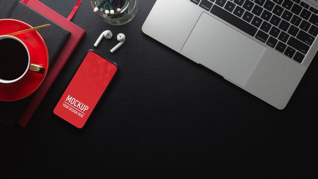 Top view of worktable with smartphone mockup