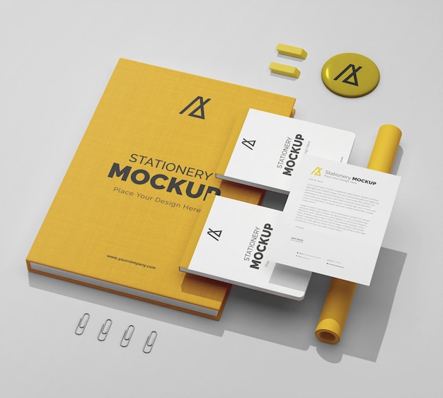 Top view over yellow stationery mockup