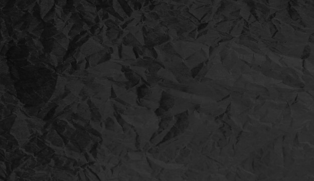 PSD torn crumpled black paper background