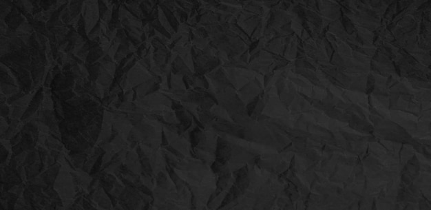 PSD torn crumpled black paper background