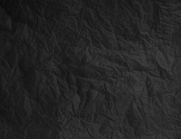 PSD torn crumpled black paper background